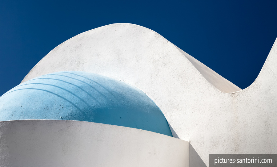 Architectural abstract in front of the deep blue sky in Firostefani, Santorini